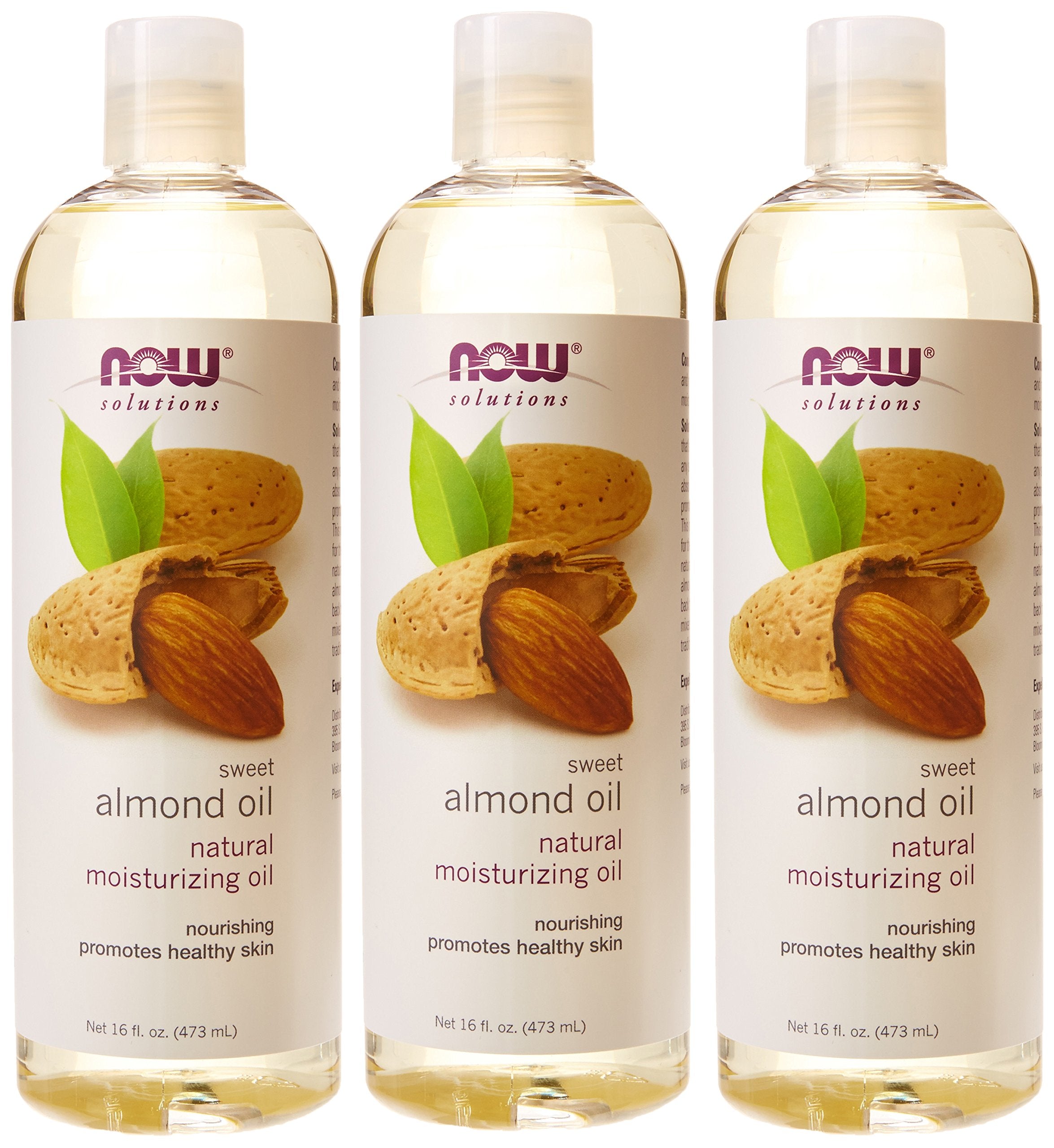 Now Foods almond oil on palm for hair conditioning and shine.