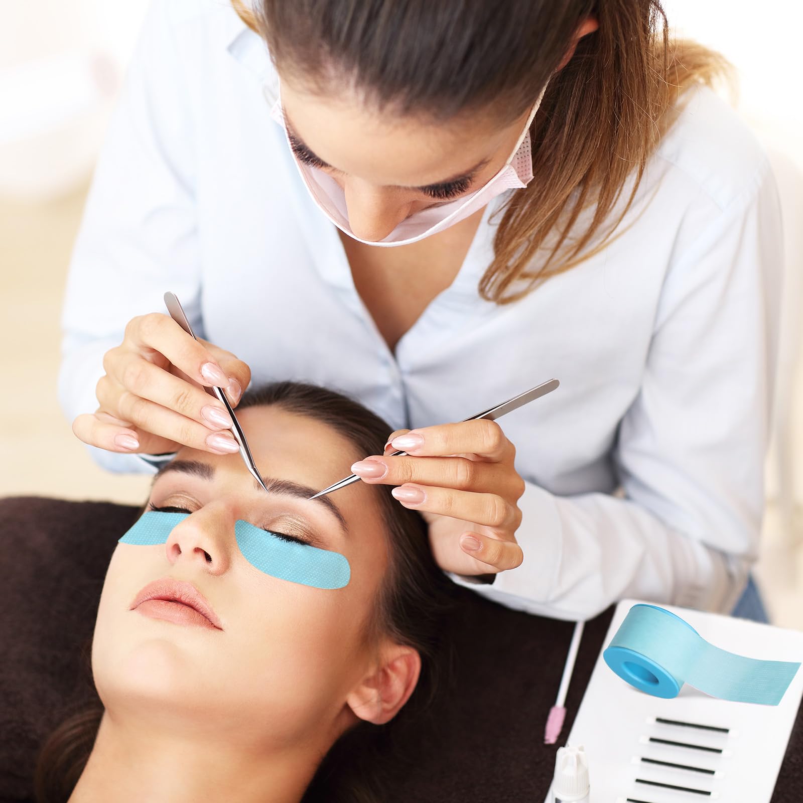 Nuanchu lash tape blue roll supports travel makeup kits and on-the-go routine.