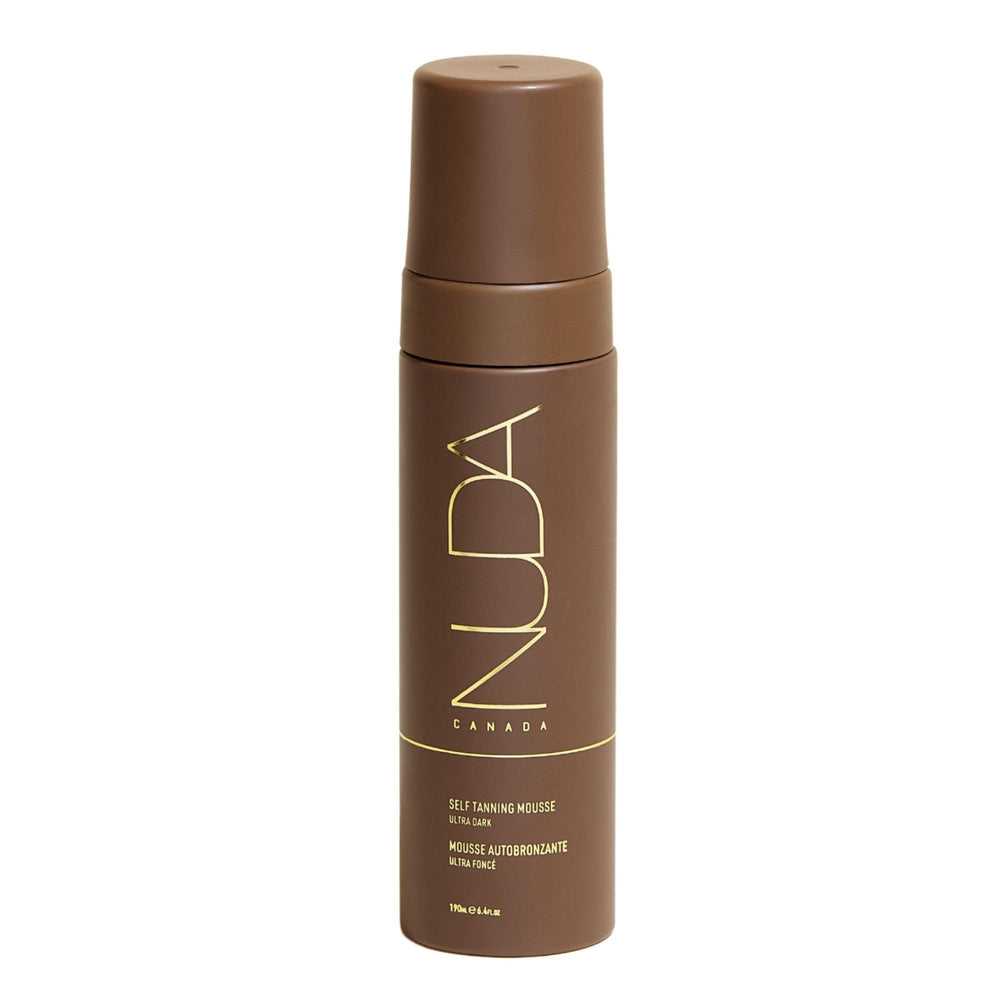 Nuda Ultra Dark BronzeFoam mousse being applied with mitt for a streak-free finish