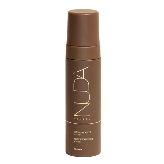 Nuda Ultra Dark BronzeFoam mousse being applied with mitt for a streak-free finish