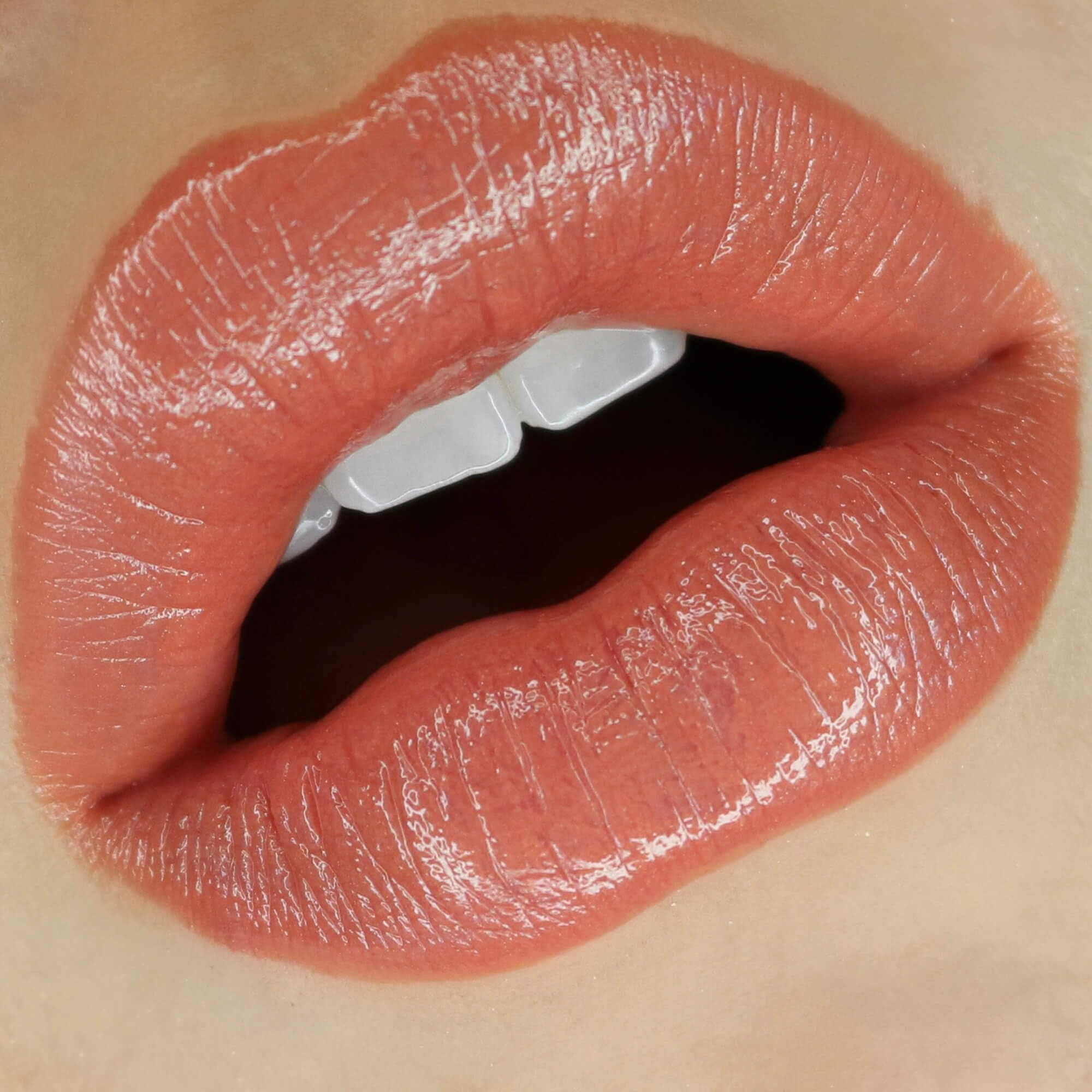 Nudestix Gel Color Lip + Cheek Balm Ally on cheek for light, blendable gel blush.