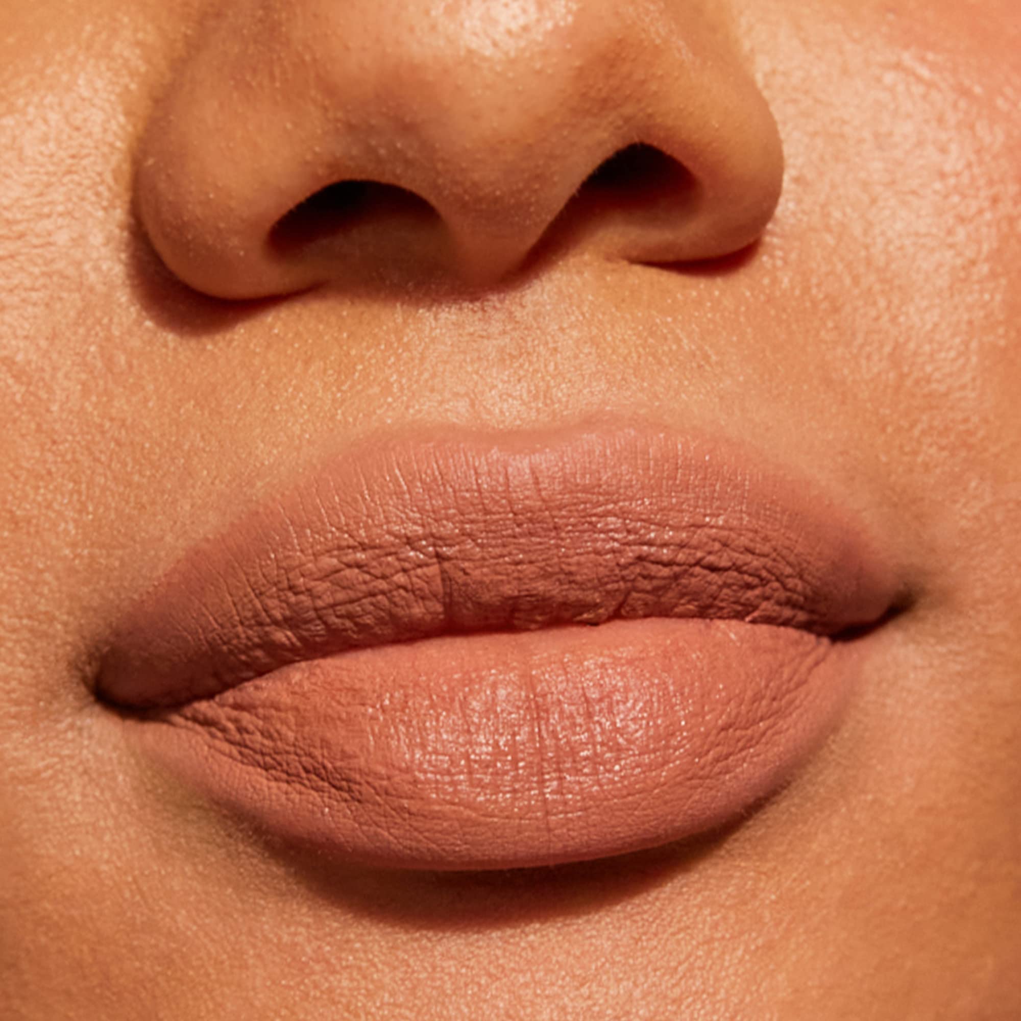 Nudestix Intense Matte Lip + Cheek Pencil applied on cheeks as soft blush.