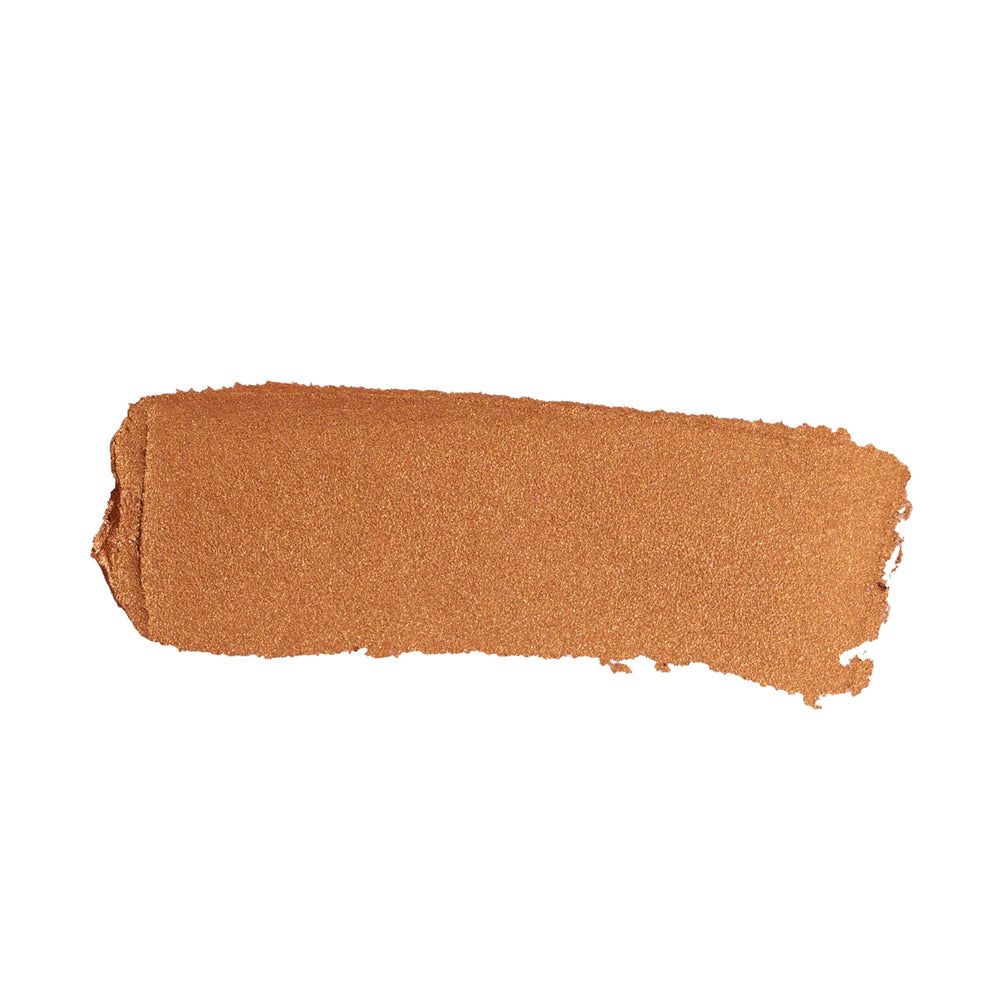 Nudestix Copper Foil pencil close-up highlights creamy texture.