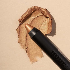 Nudestix Magnetic Luminous Eye Color Copper Foil on lid demonstrates easy blending.