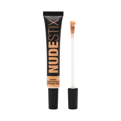 Nudestix Nudefix Cream Concealer on blemishes smooths redness for natural coverage.