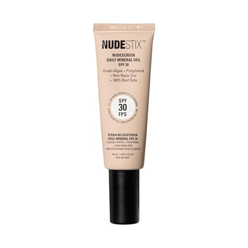 Nudestix Nudescreen warm tint swatch on arm showing natural glow.