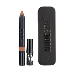 Nudestix Rustique Magnetic Luminous Eye Color swatch delivering copper-bronze glow