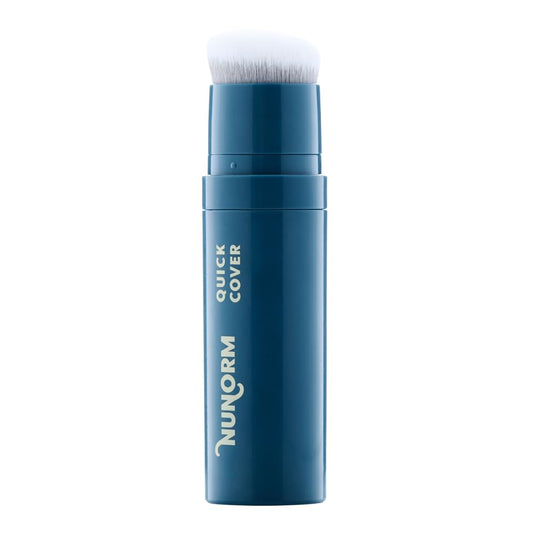 NuNorm Quick Cover Stick applied on face for discreet blemish concealment.