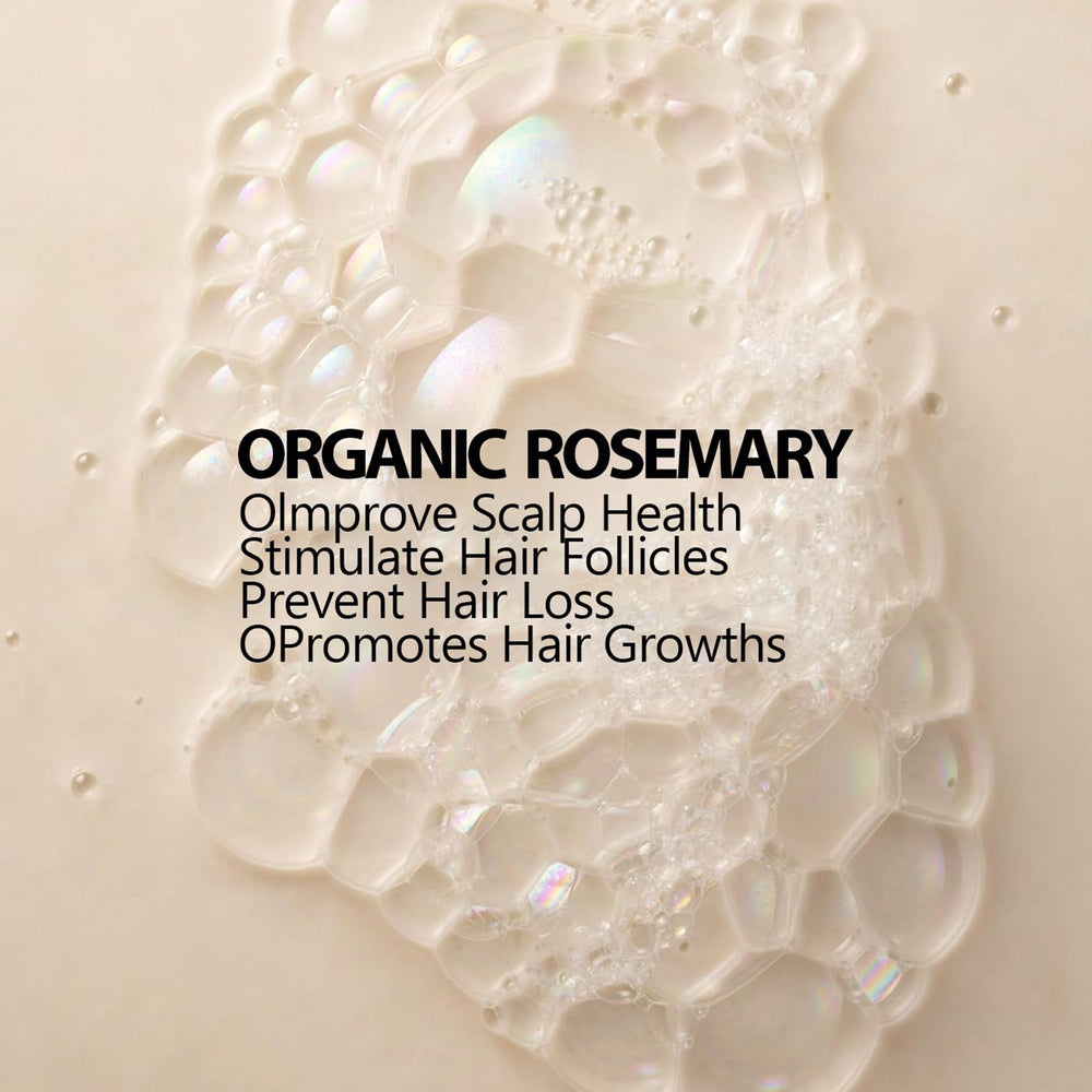 NUSQO Rosemary Shampoo lather in hand illustrating rich foam and smooth texture.