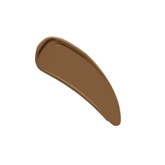 Brush-application shot of NYX Born To Glow Sienna for buildable coverage.
