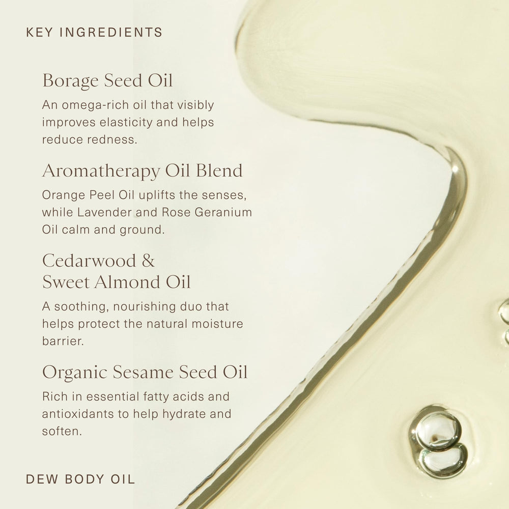 Oak Essentials Dew Body Oil amber-hued bottle on vanity for radiant skin