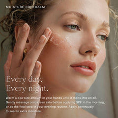 Hand applying Oak Essentials balm to demonstrate easy absorption