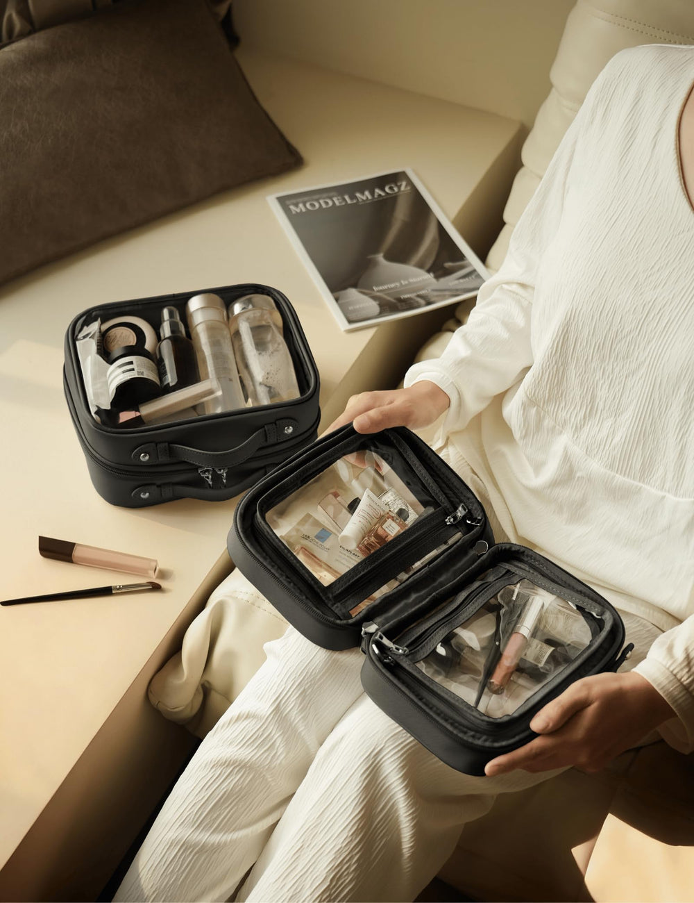 Oaque TSA-friendly clear cosmetic bag fits travel-size bottles for carry-on use.