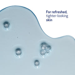 ELASTIderm Eye Serum cooling applicator in use under the eye.