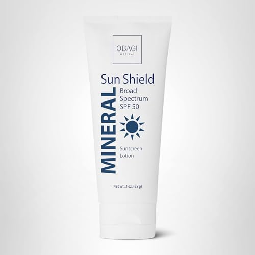 Obagi Sun Shield bottle beside sunglasses suggesting travel-friendly SPF.
