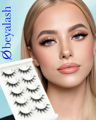 Obeyalash glueless lashes with tweezers for precise placement.