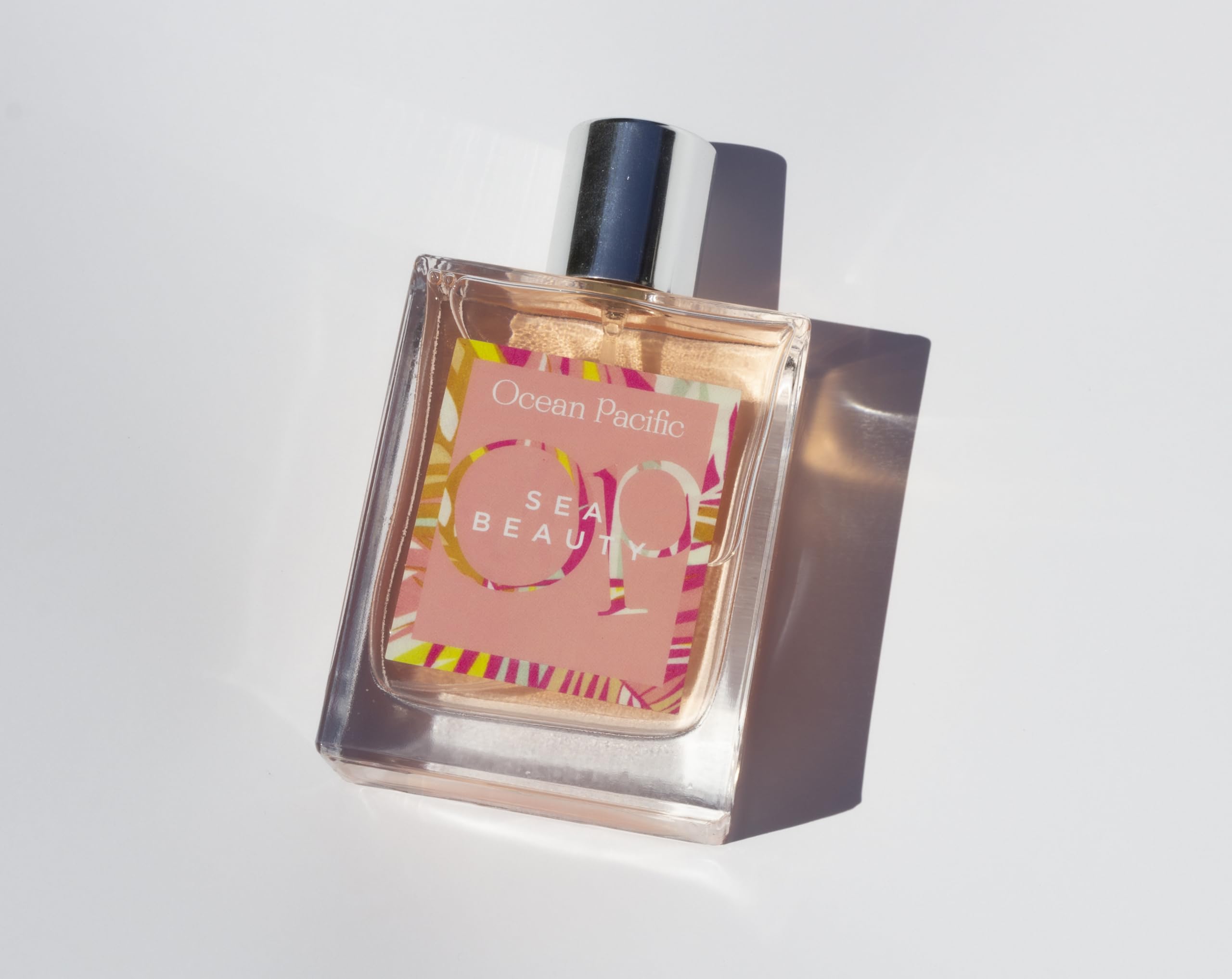 Seaside scene with Ocean Pacific Sea Beauty for Her Eau de Parfum at sunset