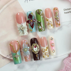 OCOUYVD gold rose steel ball nails offer subtle luxe detailing for a chic look.