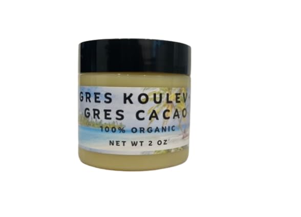 OCS cacao oil bottle reveals a rich Haitian blend for skin nourishment.
