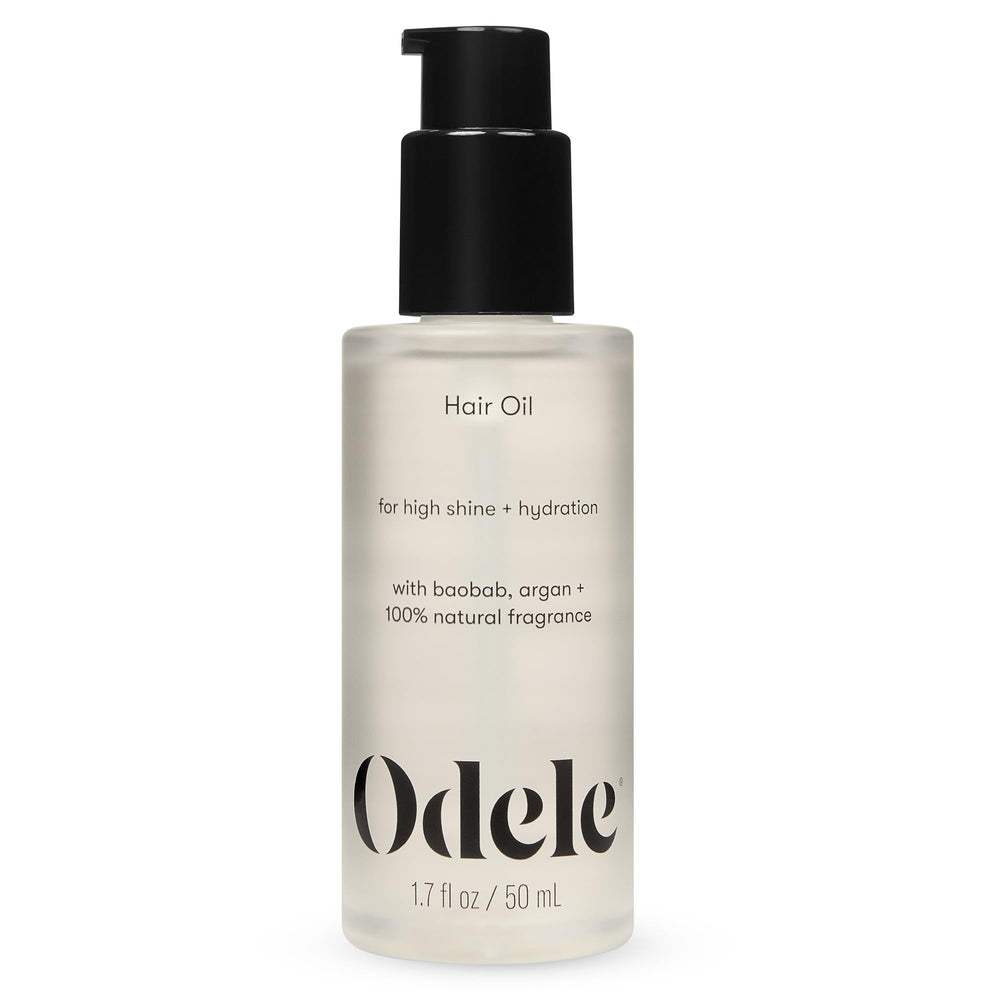 Odele Hair Oil bottle closeup highlighting hydration and high shine.