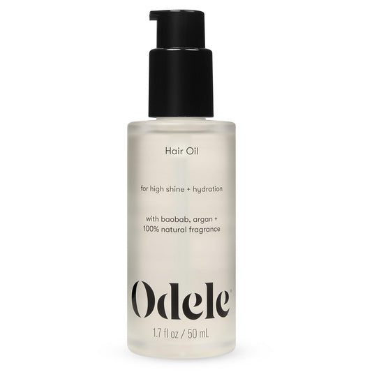 Odele Hair Oil bottle closeup highlighting hydration and high shine.