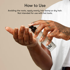 Odele Hair Oil applied to hair for a glossy, frizz-controlled look.