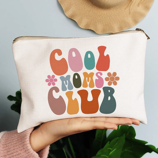 OflyDesigns Cool Moms Club bag showing golden brass zipper for chic finish.