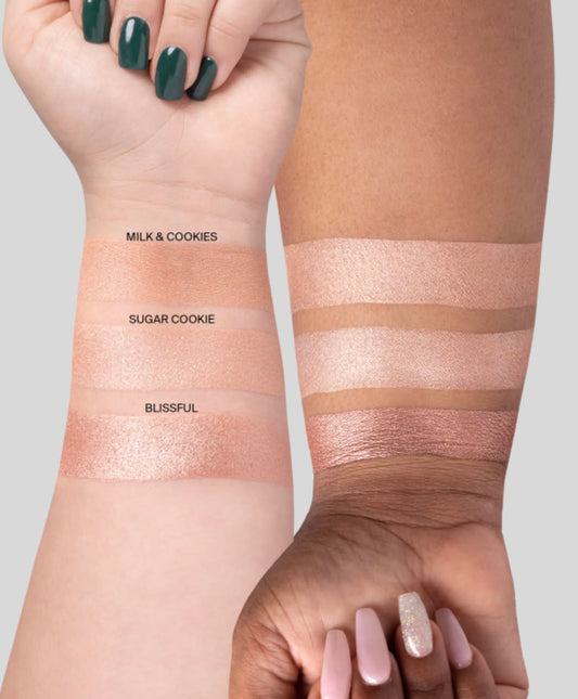 Ofra Blissful rose gold swatch showing warm undertones for versatile glow