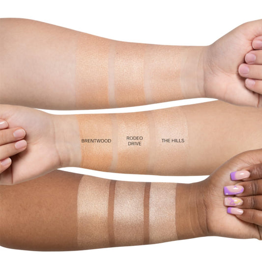 Ofra The Hills highlighter swirl shows liquid-to-baked formula for seamless radiance.