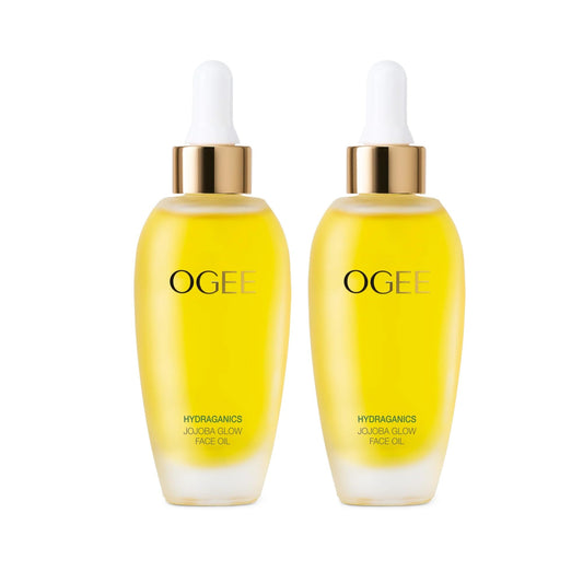 Ogee Jojoba Glow Face Oil bottle close-up for radiant hydration.