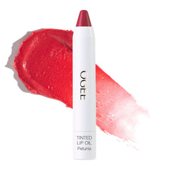 Ogee Petunia tinted lip oil swatch shows sheer blush color and shine
