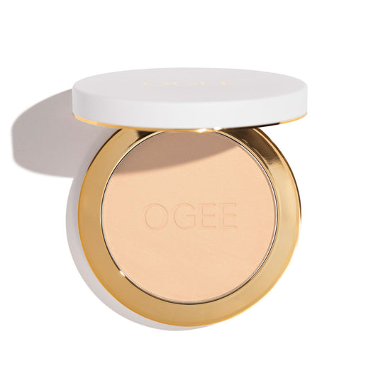 Ogee Sculpted Setting Powder Sand case for travel-ready touch-ups