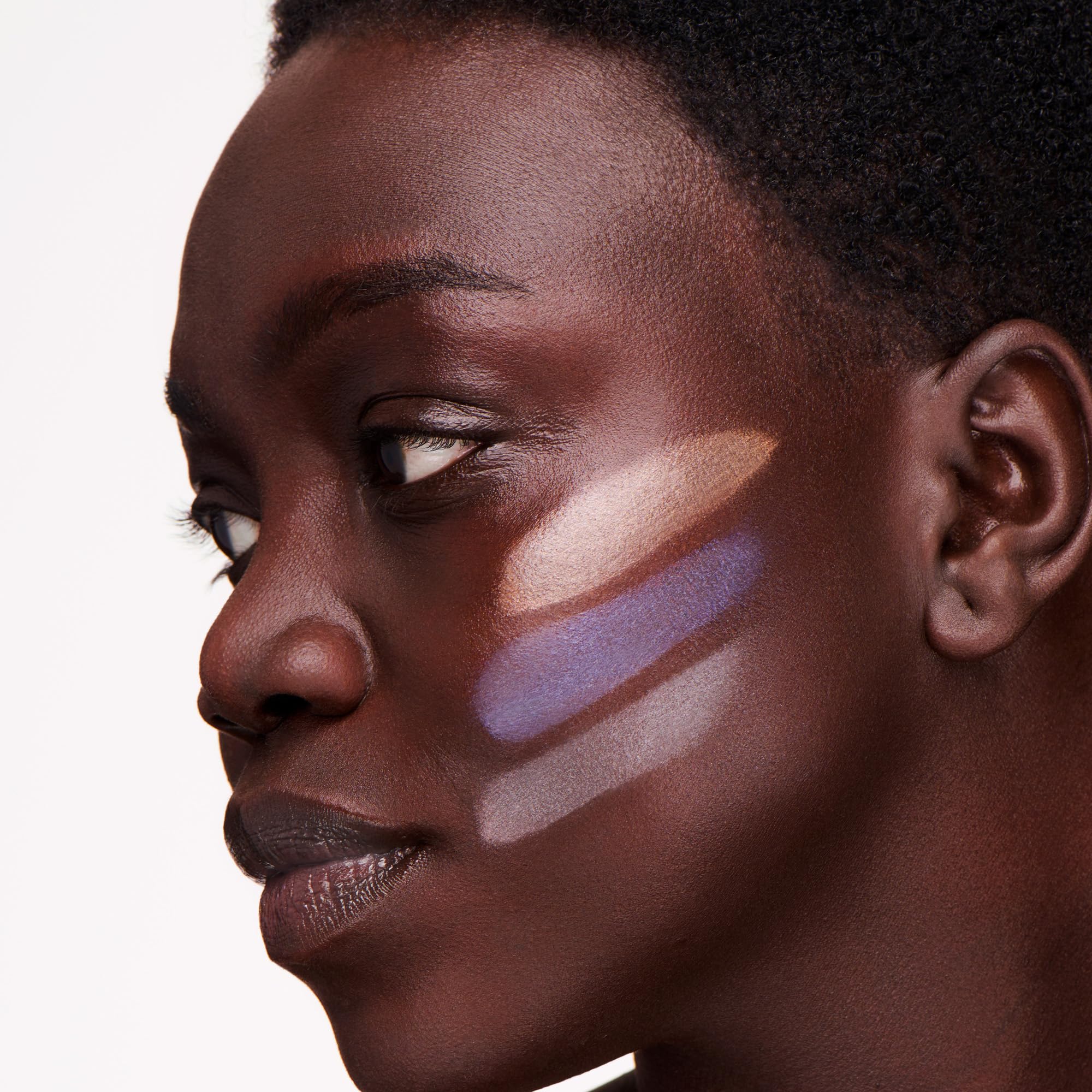 Ogee Shimmer All The Way Amethyst highlighter stick delivering a soft champagne glow for radiant cheeks.