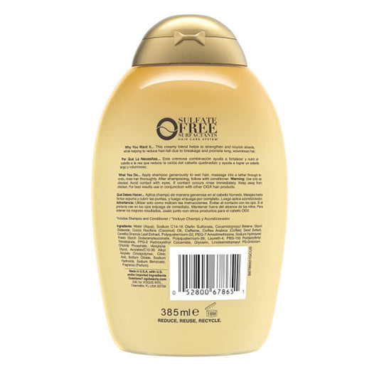 Close-up of lather from OGX shampoo emphasizing coconut oil and coffee extract nourishment.