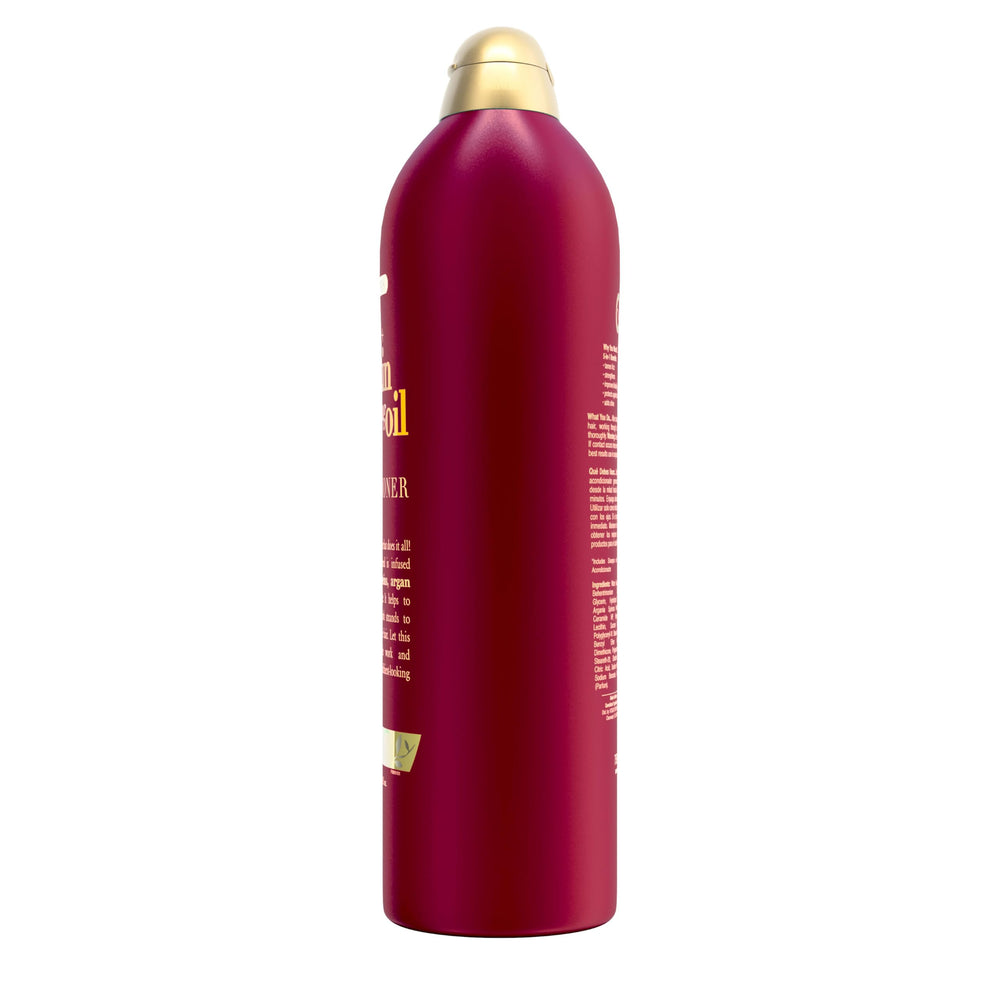 OGX Frizz-Free + Keratin Smoothing Oil Conditioner humidity protection shown on a windy day