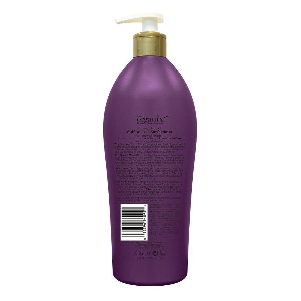 Close-up of OGX conditioner label highlighting biotin and collagen benefits