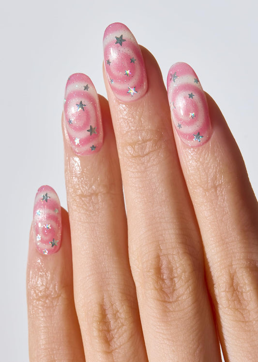 Ohora N Candy Swirl nails worn with wraps for salon-style result.