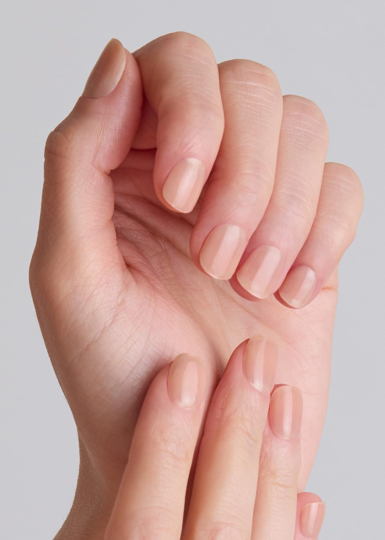 Ohora N Bare Milk Tea wraps applied on nails for a quick salon-like manicure.