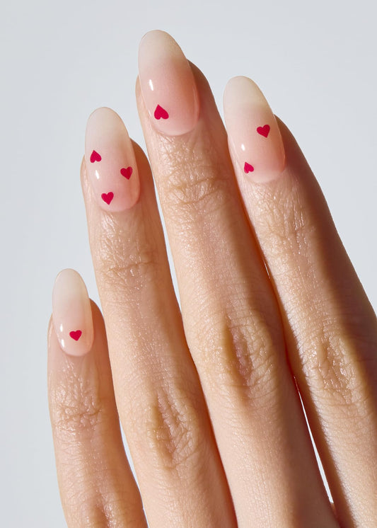 Ohora N Mini Heart nail strips close-up highlighting detailed design and glossy finish.