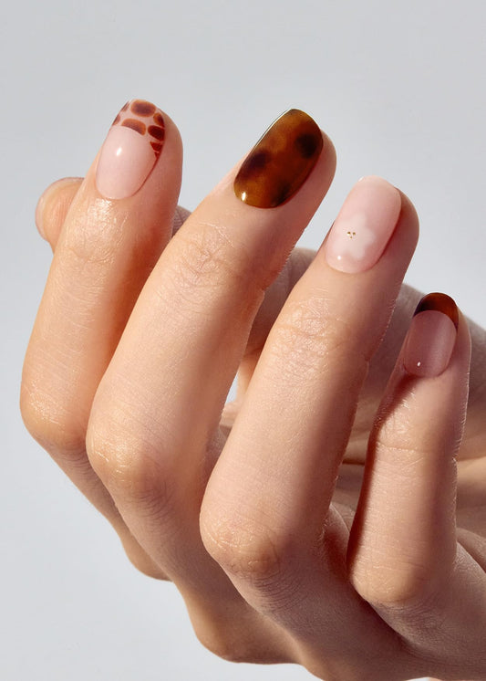 ohora application steps featuring N Tiki Tortoise strips for simple home manicure