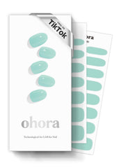 Ohora semi-cured nail strips in Green Cream Window for long-lasting salon-quality wear.