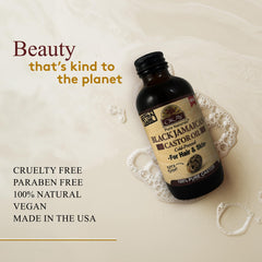 OKAY Pure Naturals Extra Dark Castor Oil bottle with hair illustration indicating growth support