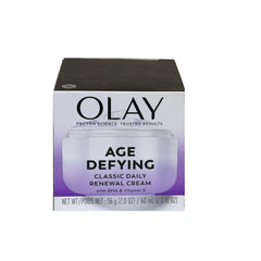 Olay Age Defying 2oz tube close-up showing smooth texture for daily hydration.