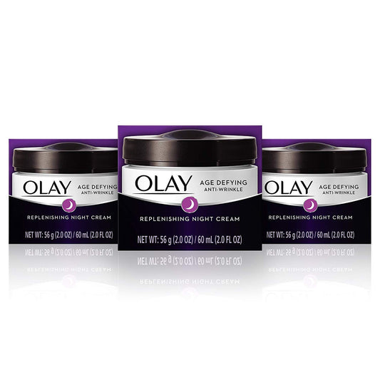 Olay Age Defying Night Cream bottle pour for fast-absorbing overnight hydration.