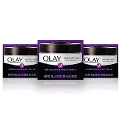 Olay Age Defying Night Cream bottle pour for fast-absorbing overnight hydration.