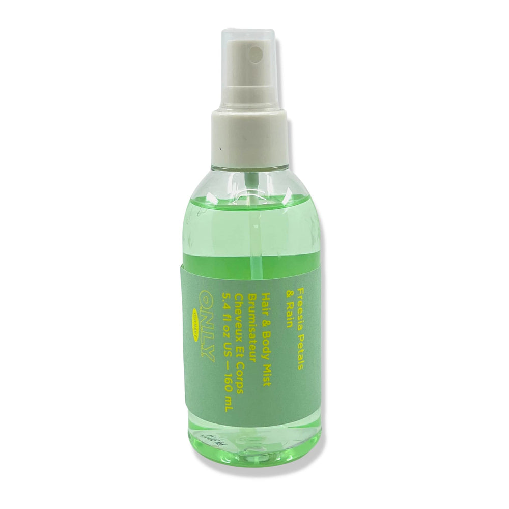 Old Navy Kindred Goods Freesia Petals & Rain hair and body mist bottle pour for daily freshness.