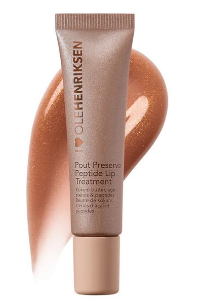 Ole Henriksen Pout Preserve Glimmer Lingonberry Jam on lips provides rich color and luminous glow.