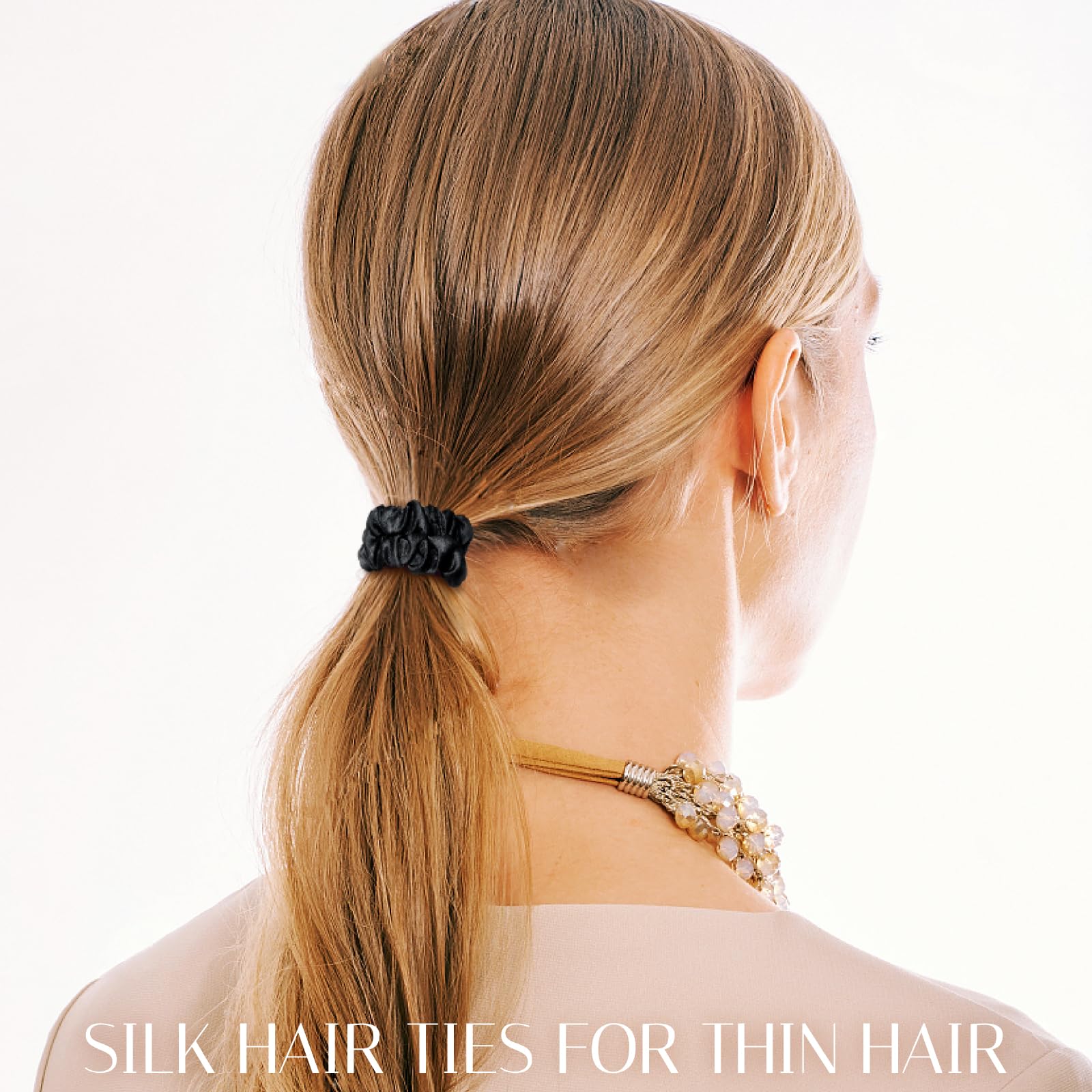 OLESILK silk hair ties closeup texture highlights smooth surface for gentle grip.
