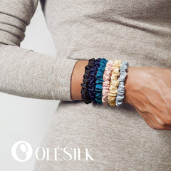 OLESILK silk hair ties worn as bracelets show versatile, convenient wear.