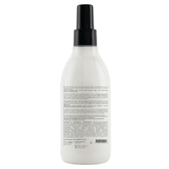 Oligo Calura Express Blowout Mist sprayed on damp hair for reduced drying time and protection